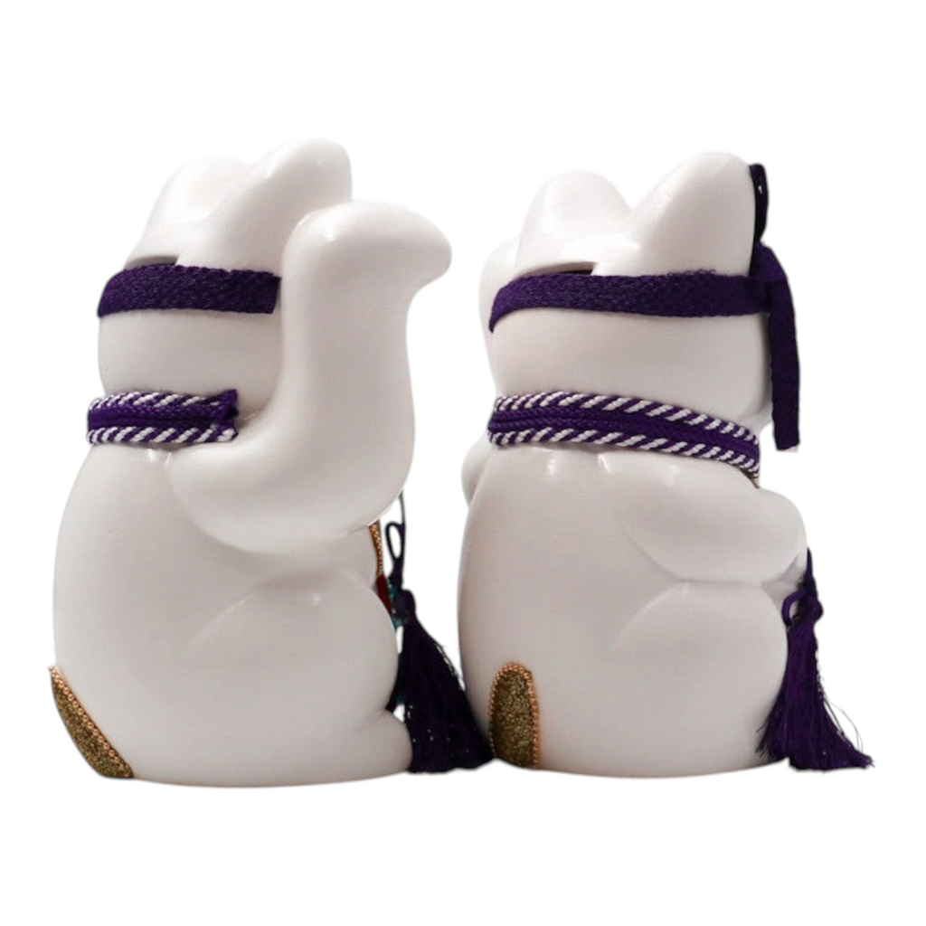 Twinkle Glory Goenneko ceramic lucky cat figurines in white with purple Kabuki-style headbands and tassels