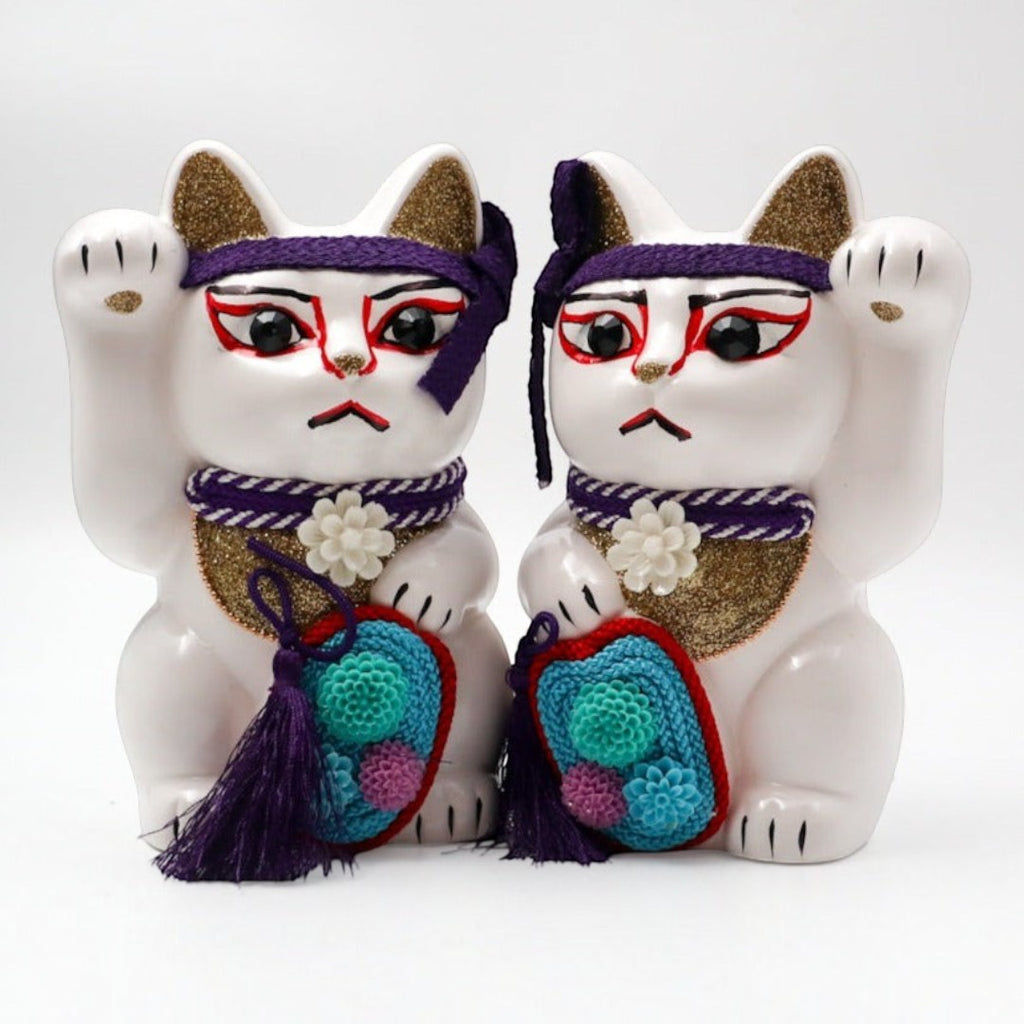 Twinkle Glory Goenneko ceramic lucky cat figurines featuring traditional Japanese Kabuki makeup and purple accents.