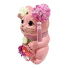 Twinkle Glory Goenneko pink ceramic lucky cat figurine decorated with seasonal flowers and a silk tassel