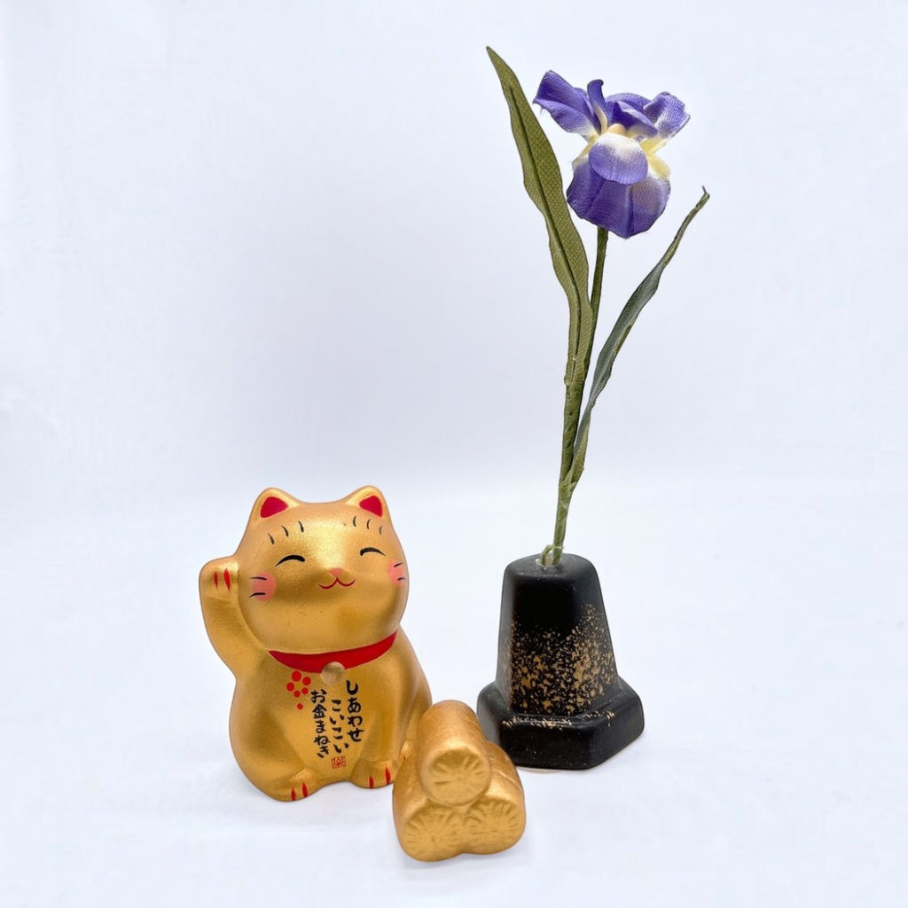 Twinkle Glory hand-painted gold porcelain Japanese Lucky Cat figurine with a small gold ingot and purple iris flower