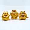 Twinkle Glory set of three gold hand-painted porcelain muscle lucky cat mascots for wealth and good fortune.