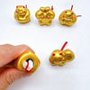 Twinkle Glory gold porcelain lucky cat mascots with muscle design, handmade and hand-painted for good fortune.