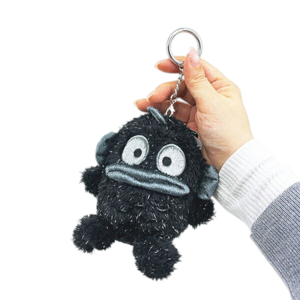 Twinkle Glory Sanrio Hangyodon plush keychain in black fuzzy polyester with a silver aluminium carabiner attachment