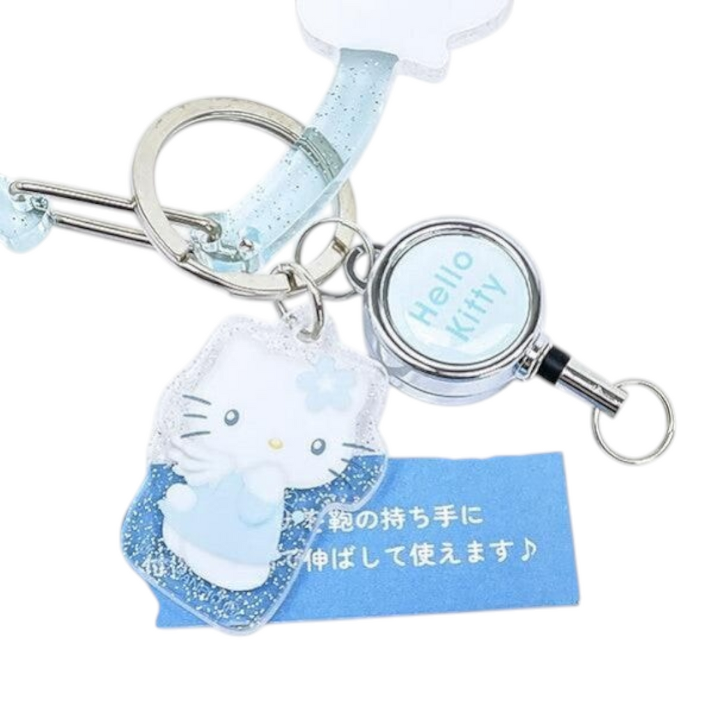 Twinkle Glory Hello Kitty Sparkling Angel acrylic keychain with a retractable reel and silver metal hardware.