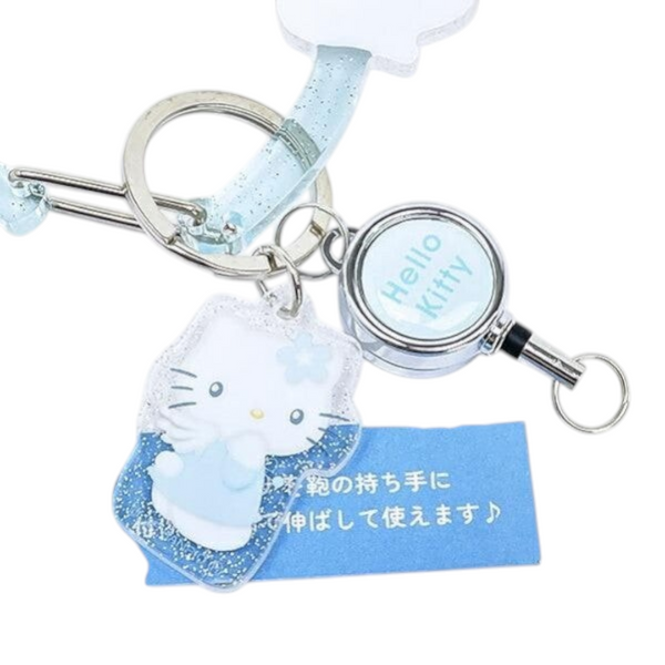 Twinkle Glory Hello Kitty Sparkling Angel acrylic keychain with a retractable reel and silver metal hardware.