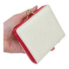 Twinkle Glory Hello Kitty bifold wallet in cream and red synthetic leather with a gold clasp closure