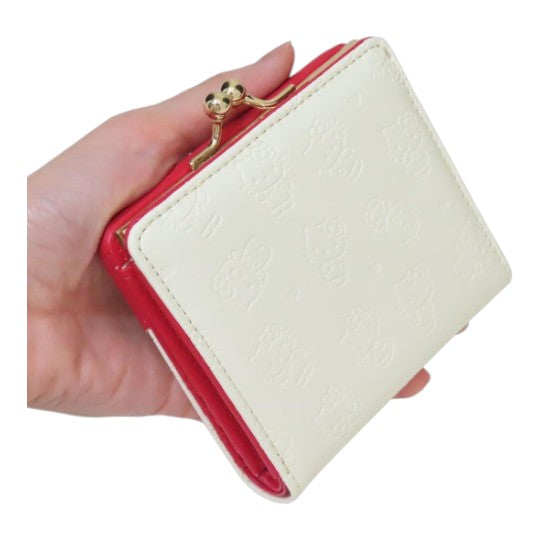 Twinkle Glory Hello Kitty bifold wallet in cream and red synthetic leather with a gold clasp closure