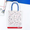 Twinkle Glory Hello Kitty water resistant polyester eco bag with a white grid pattern and red character details