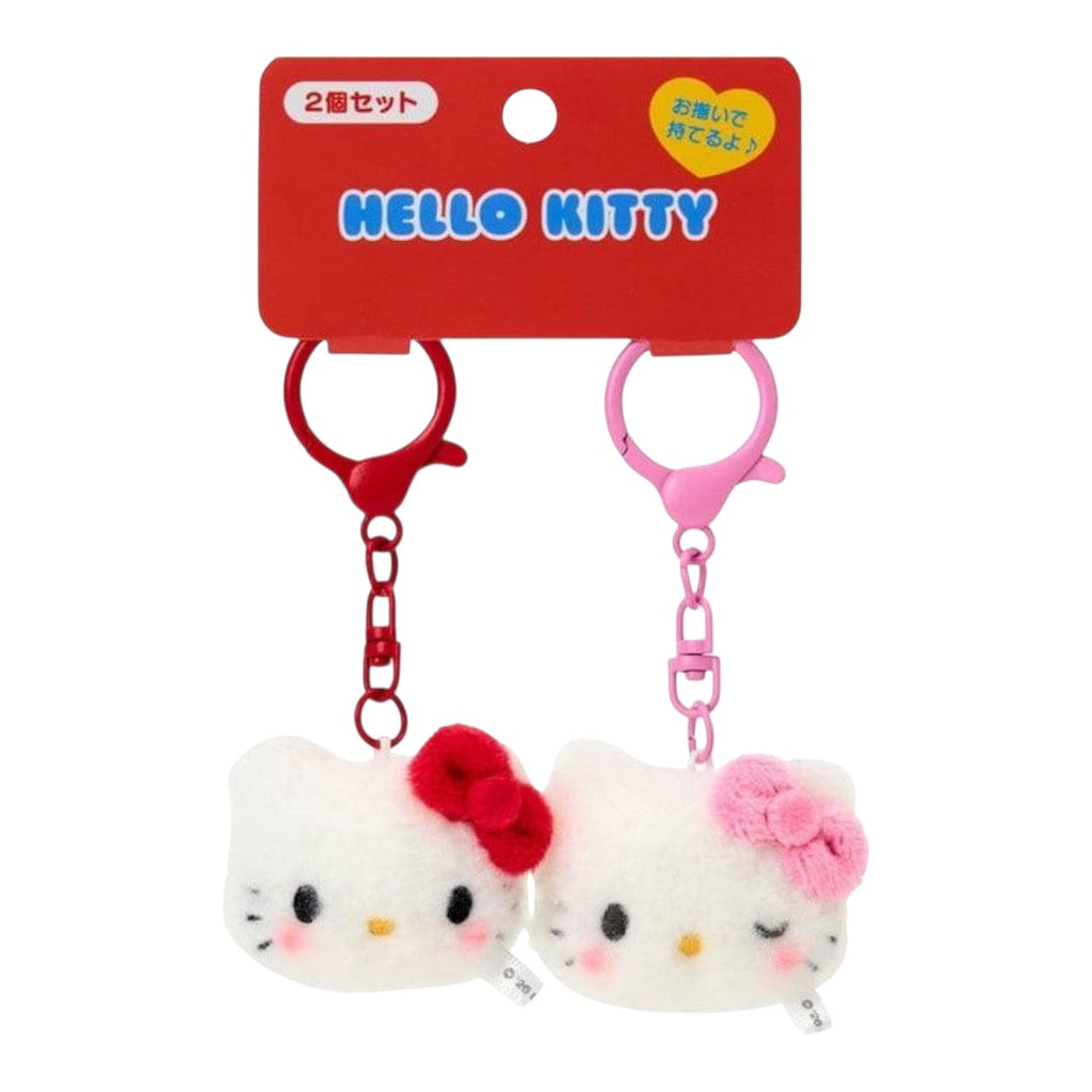 Twinkle Glory Sanrio Hello Kitty fluffy polyester key ring pair with red and pink bows and matching plastic clips