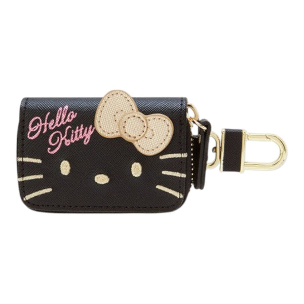 Twinkle Glory Sanrio Hello Kitty black PU leather key case with gold embroidered bow and Hello Kitty face details