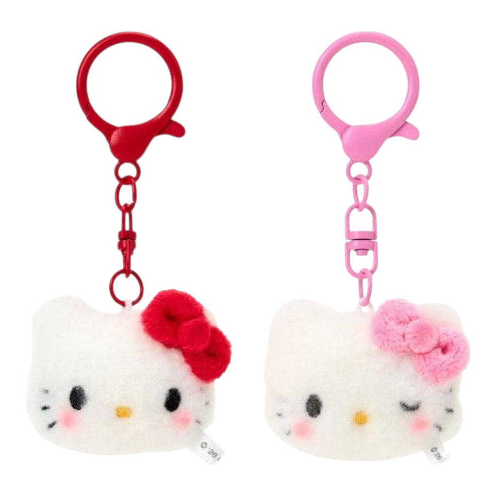 Twinkle Glory Sanrio Hello Kitty fluffy plush key ring pair with red and pink bows and matching metal clasps