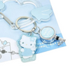 Twinkle Glory Hello Kitty retractable carabiner reel clip in glittery light blue acrylic with angel wing design