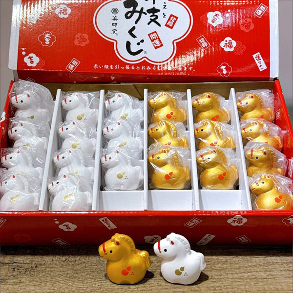 Twinkle Glory Yakushigama Year of the Horse zodiac omikuji figurines in gold and white ceramic displayed in a box