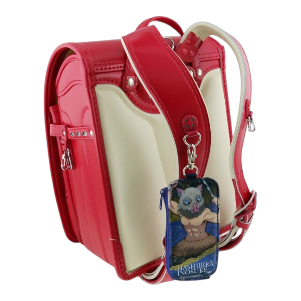 Twinkle Glory Demon Slayer Inosuke PVC key case with retractable reel attached to a red and white school backpack
