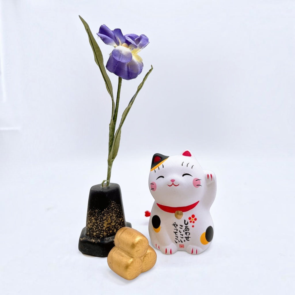 Twinkle Glory mini porcelain Japanese Lucky Cat figurine with hand-painted details, displayed with a flower and gold