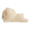 Twinkle Glory Korilakkuma flocked figure in a lying down pose with a soft white velvety texture