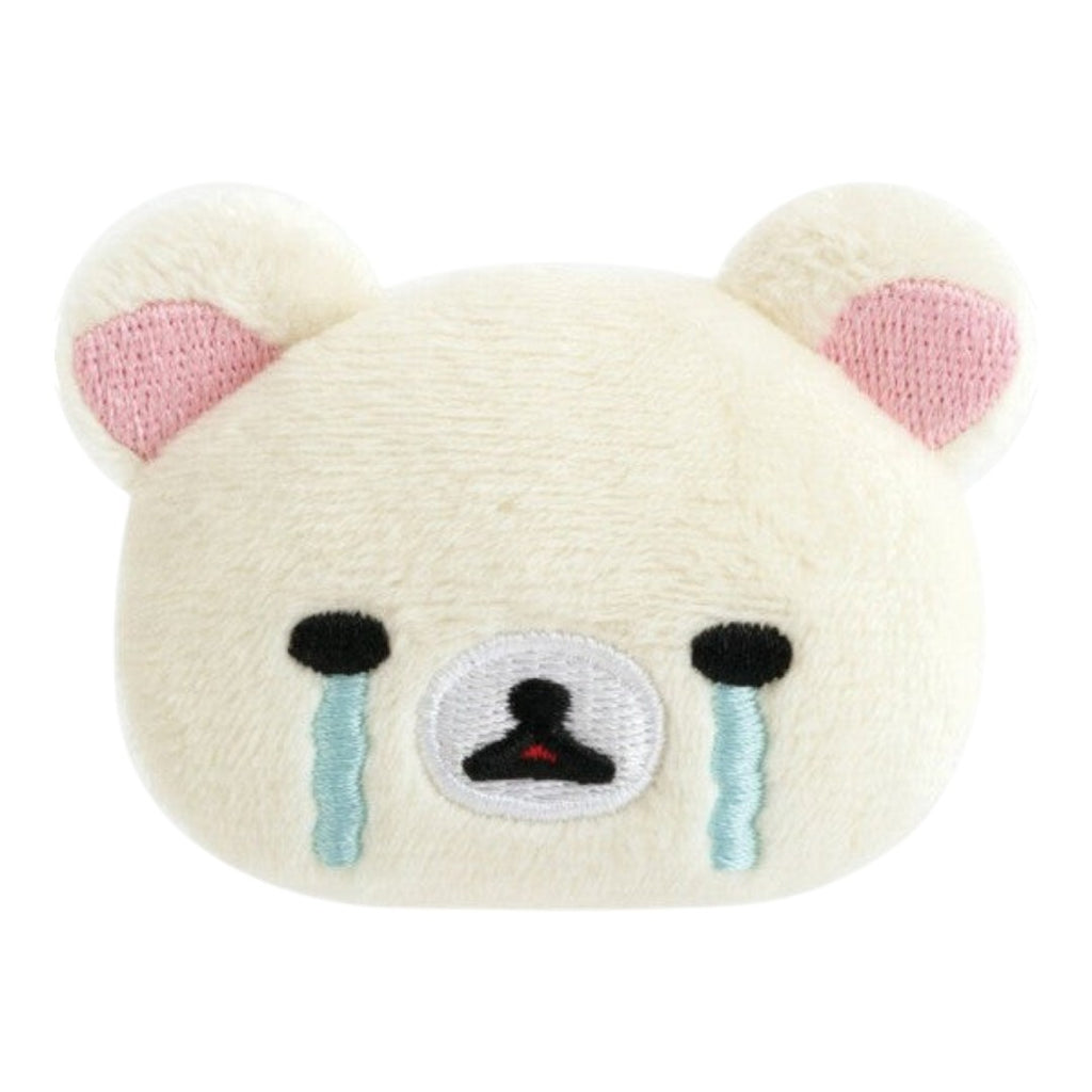 Twinkle Glory San-X Korilakkuma plush badge featuring a white bear face with embroidered crying tears expression