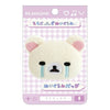 Twinkle Glory San-X Korilakkuma plush badge featuring a white bear face with blue crying tears on a display card