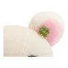 Twinkle Glory San-X Korilakkuma plush ear detail with a small green clover charm on soft cream and pink fabric