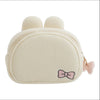 Twinkle Glory San-X Korilakkuma plush pouch with built-in mirror and pink bow detail. Cream polyester.