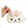 Twinkle Glory San-X Korilakkuma plush pouch with a built-in mirror and pink bow. Soft polyester material.