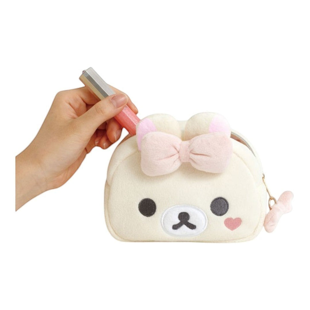 Twinkle Glory San-X Korilakkuma plush pouch with a soft cream exterior, pink bow, and built-in mirror for cosmetics.