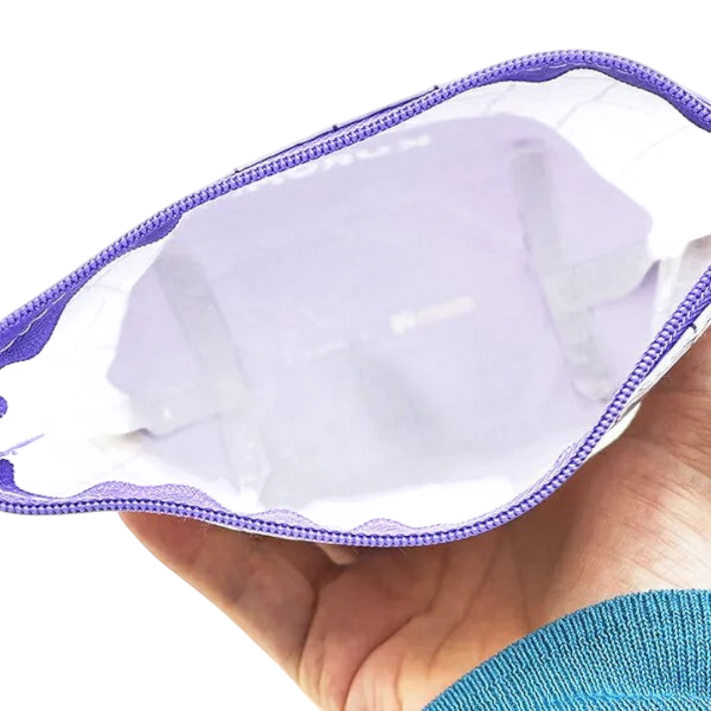 Twinkle Glory Sanrio Kuromi polyethylene pouch with a purple zipper and clear interior for storing small accessories.