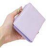 Twinkle Glory Sanrio Kuromi purple synthetic leather bifold wallet with gold clasp closure and embossed character art