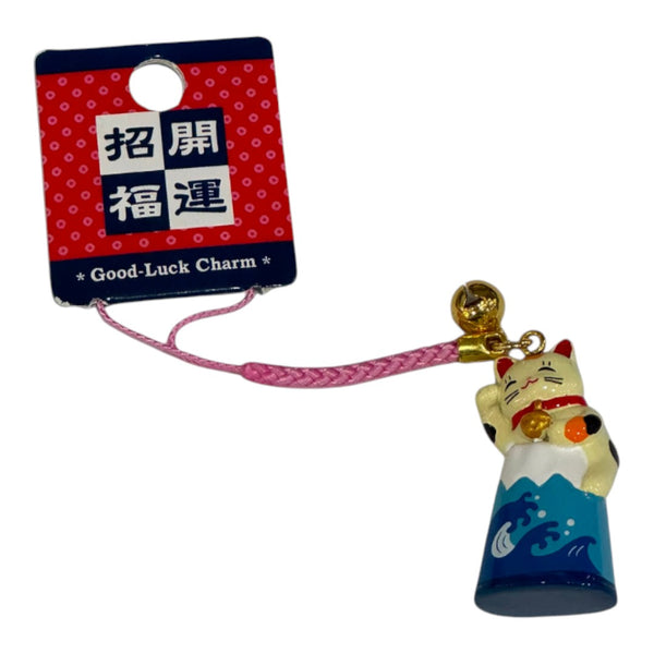 Twinkle Glory Japanese lucky cat and Mount Fuji bag charm with a pink strap and gold bell