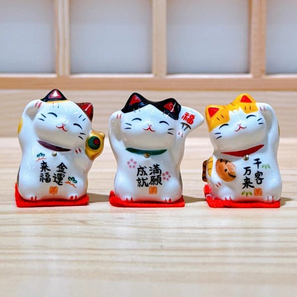 Twinkle Glory Yakushigama mini ceramic lucky cat figurines in a set of three with traditional Japanese calligraphy