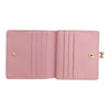 Twinkle Glory Sanrio My Melody pink bifold wallet interior with card slots and gold clasp closure