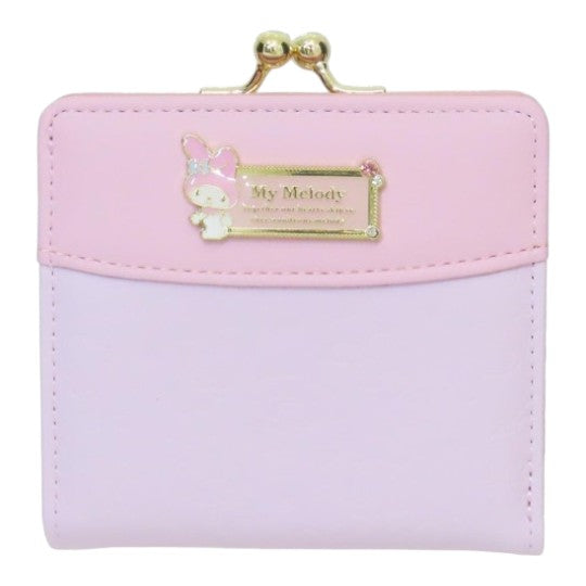 Twinkle Glory Sanrio My Melody bifold wallet in pastel pink with a gold metal clasp closure and character plaque.