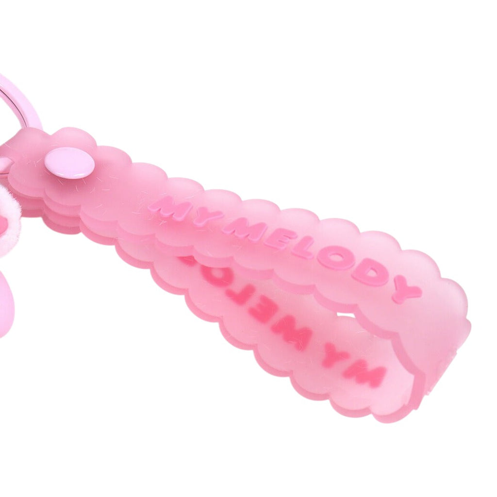 Twinkle Glory pink My Melody keychain strap with scalloped edges and embossed character name on a white background