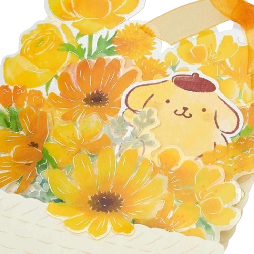 Twinkle Glory Sanrio Pompompurin greeting card featuring a yellow floral basket design with watercolor flowers