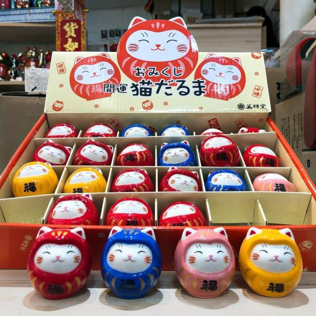 Twinkle Glory collection of hand-painted porcelain Daruma lucky cat mascots in various bright colours