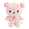 Twinkle Glory San-X Rilakkuma plush keychain in soft pink with cherry blossom sakura patterns and flower accents