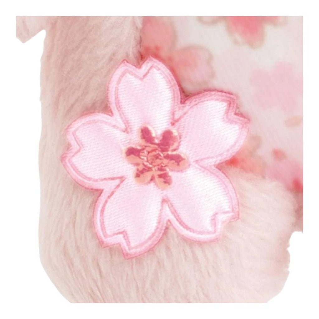 Twinkle Glory San-X Rilakkuma plush keychain featuring a detailed pink embroidered cherry blossom sakura flower