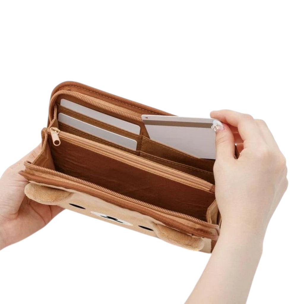 Twinkle Glory brown polyester Rilakkuma travel wallet with interior card slots and zipper compartments