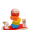 Twinkle Glory Ryukodo porcelain Daruma Otoshi stacking game with a hand-painted lucky cat on a red cloth and wood base