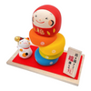 Twinkle Glory Ryukodo porcelain lucky cat and colorful Daruma Otoshi stacking game set on a red cloth and wooden base