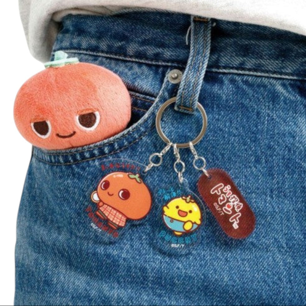 Twinkle Glory San-X Uso Tantei Tomanto acrylic 3-charm keyring attached to blue denim jeans pocket