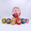 Twinkle Glory Japanese six-color paper Daruma dolls featuring a large pink centerpiece and smaller colorful figures.