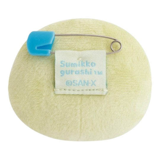 Twinkle Glory San-X Sumikko Gurashi Ebiten no Shippo plush badge back view showing the blue safety pin attachment