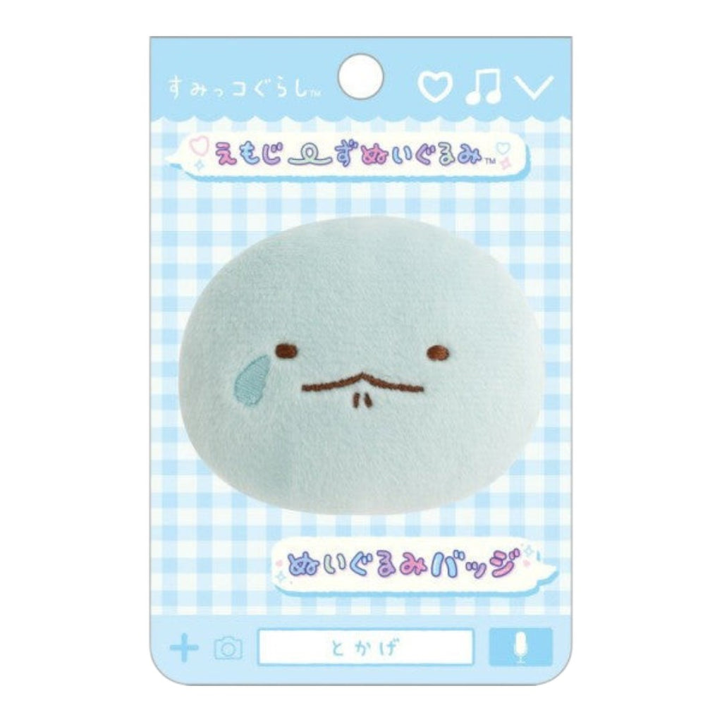 Twinkle Glory San-X Sumikko Gurashi Tokage plush badge featuring a soft blue crying lizard character on display card