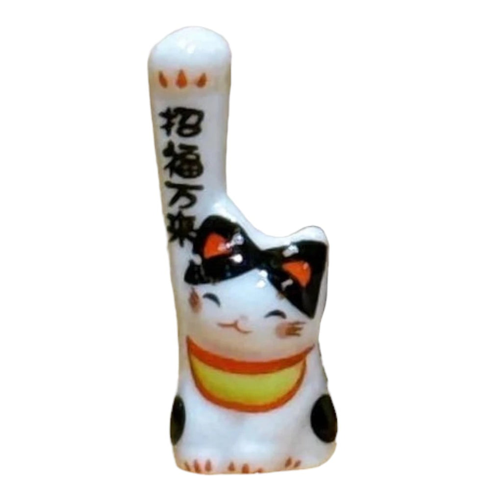 Twinkle Glory white porcelain Maneki-neko lucky cat figurine with black spots and raised paw