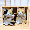 Twinkle Glory Yakushigama porcelain Maneki Neko cat figurines in tricolour and tiger patterns with gold bells
