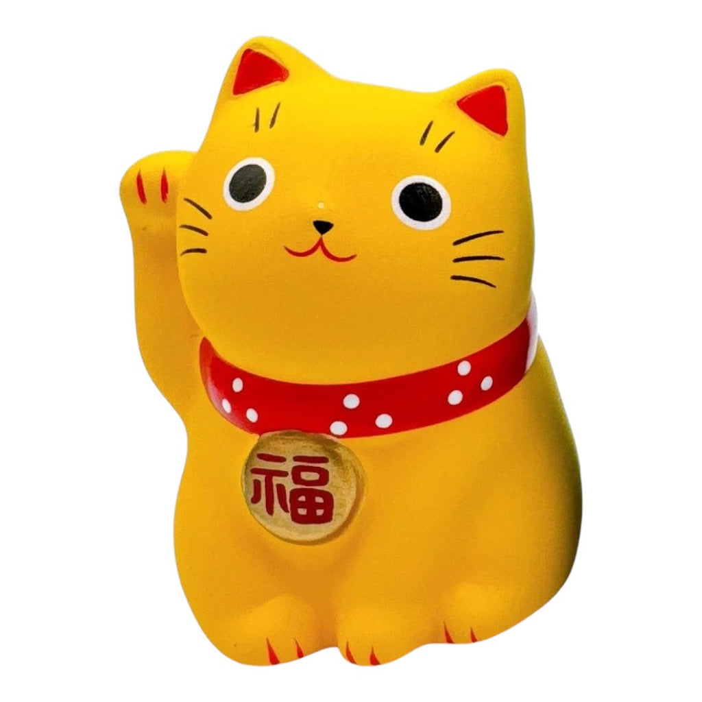Twinkle Glory yellow Yakushigama hand-painted lucky cat figurine with a red collar and raised paw for good fortune