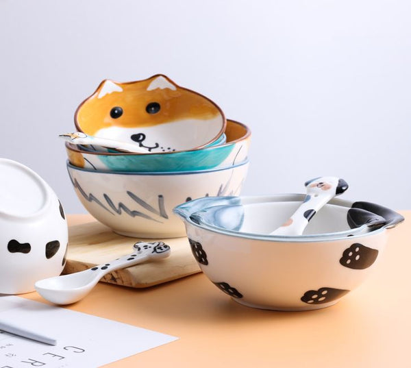 Stacks of dog shaped bowls with spoons