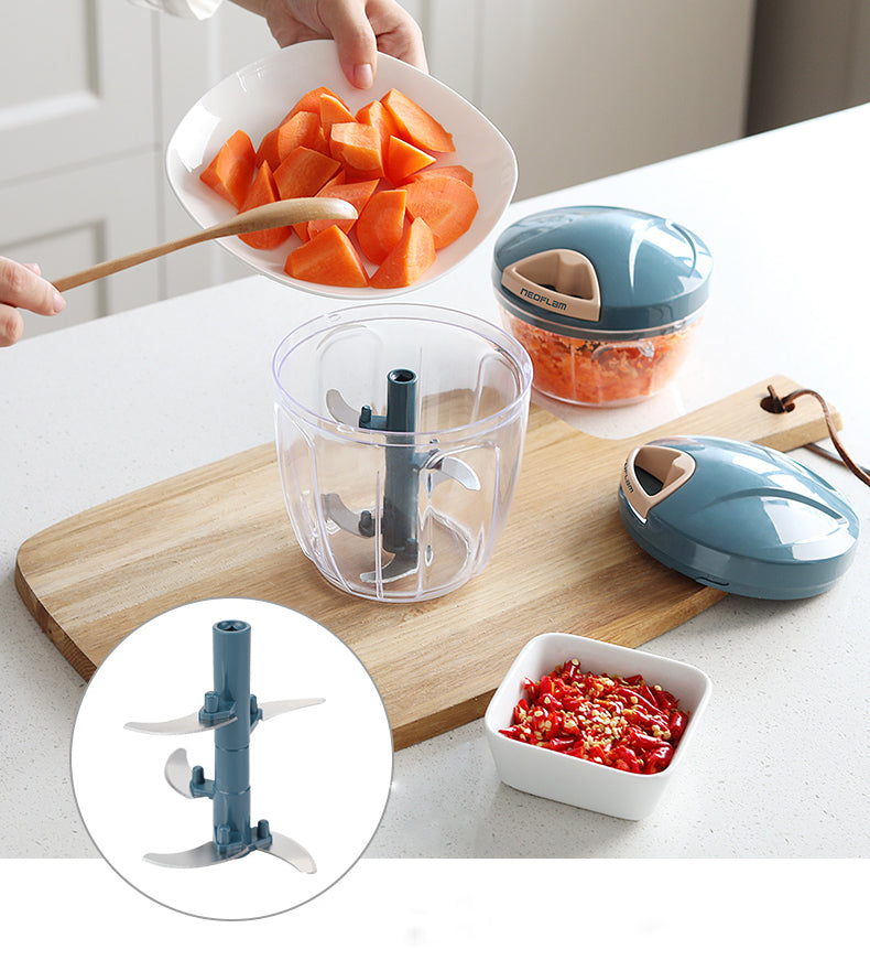 Adding vegetables into a NEOFLAM multipurpose chopper