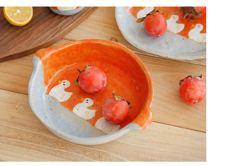 Tomatoes inside a Duck Pattern Ceramic Bowl